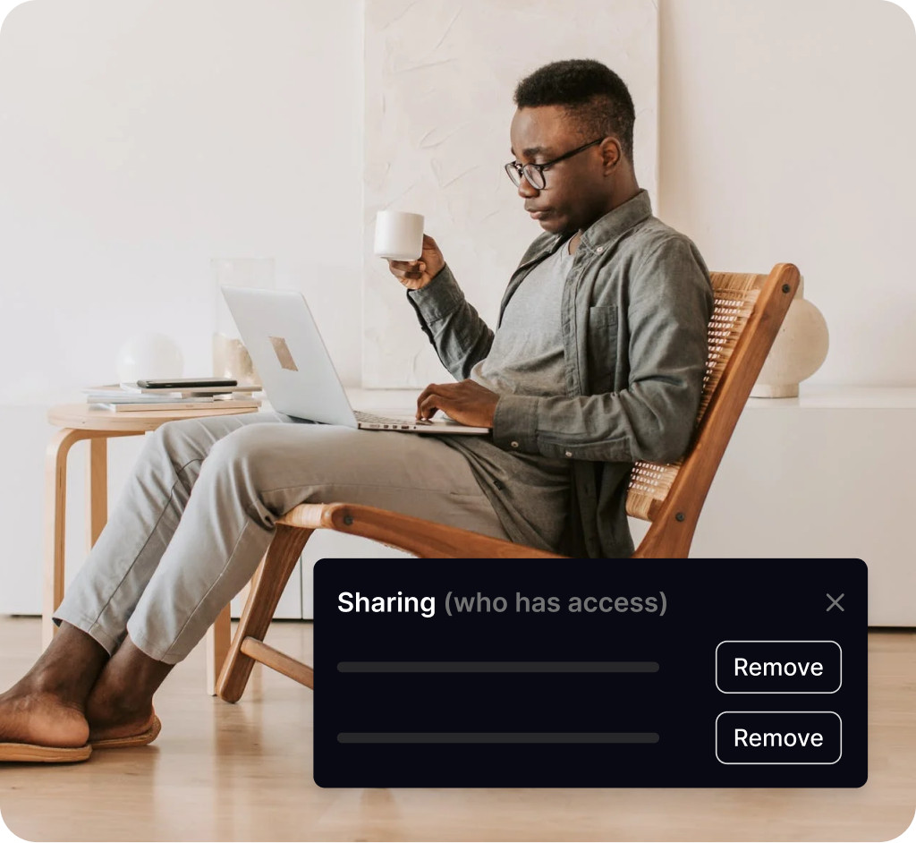 photo of a man using a laptop